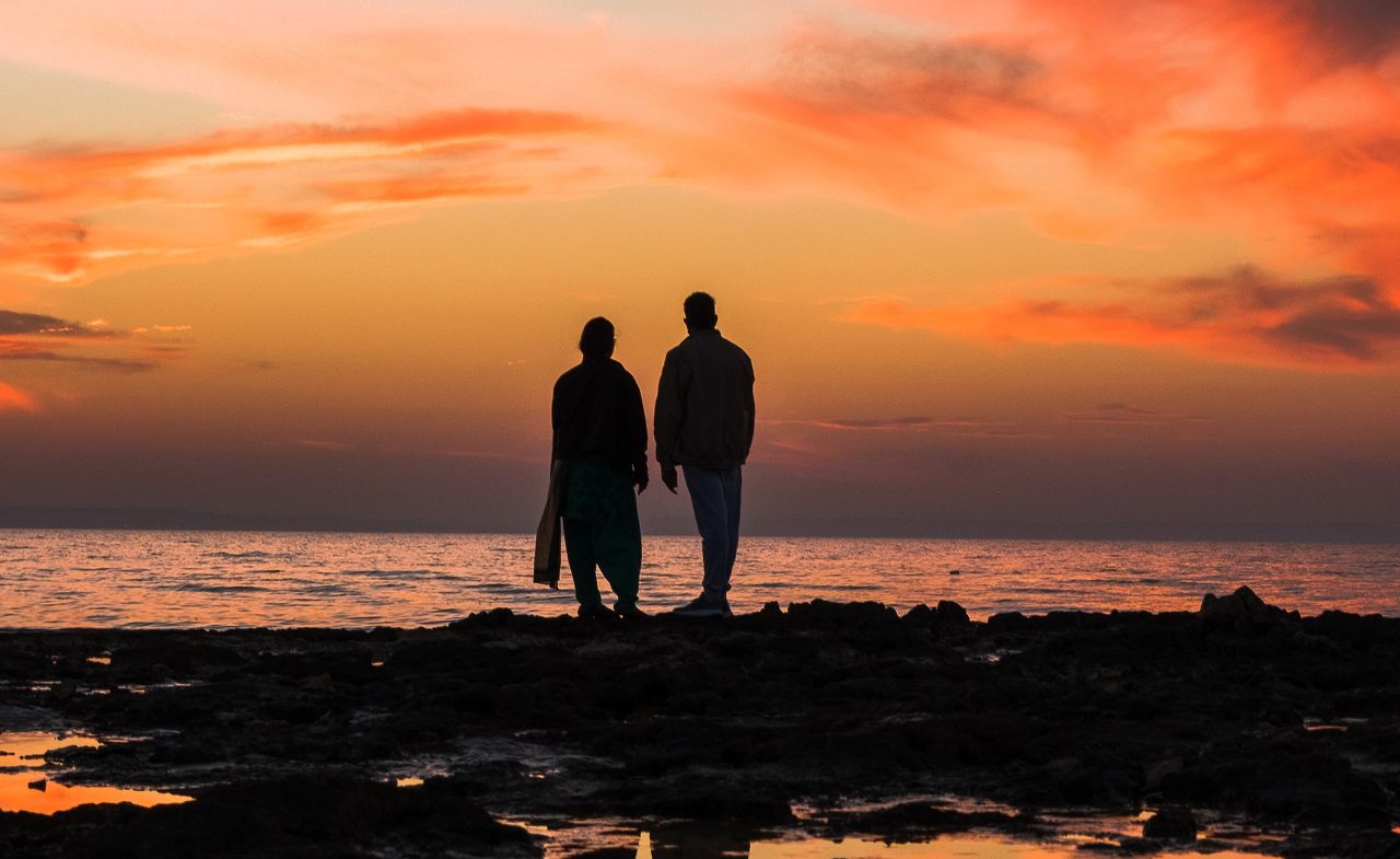 couple at the sunset on the seaside