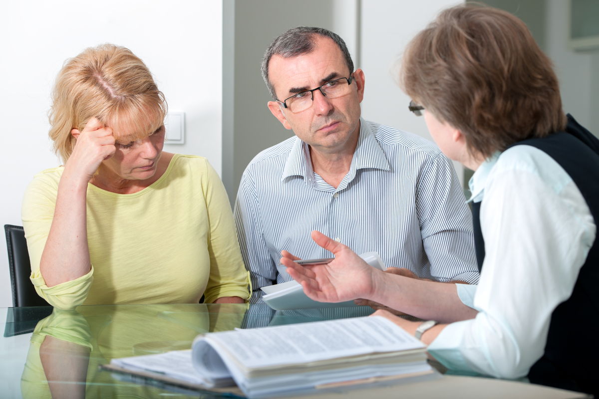 Couple discussing with a Family Counsellor
